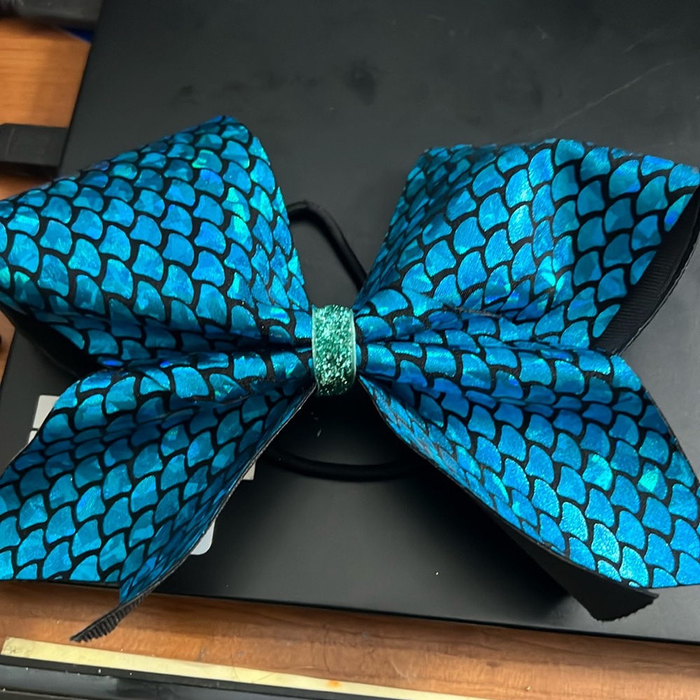 Black and turquoise mermaid scale cheer bow.
